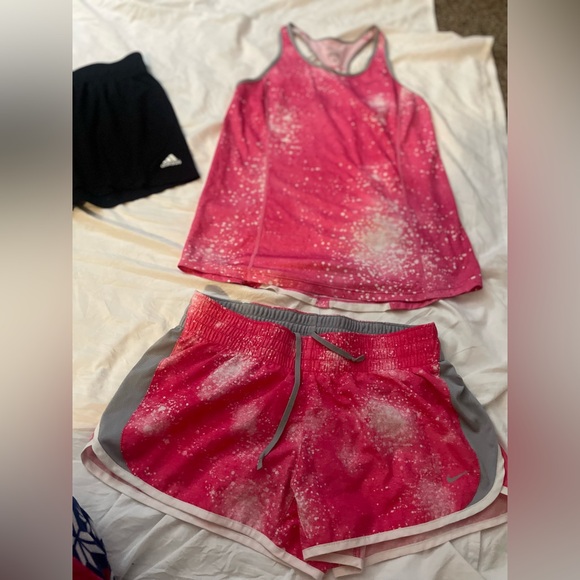 One pair of Adidas, running shorts, large, and one Nike short set, medium - Picture 8 of 9